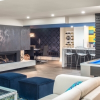 1_Basement-living-room-with-bar-and-pool-table-and-poker-area