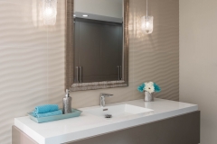 Basement-bathroom-with-floating-vanity-in-benjamin-moore-barnboard-and-eden-tile-wall