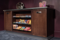 Basement-theatre-with-custom-popcorn-and-candy-station